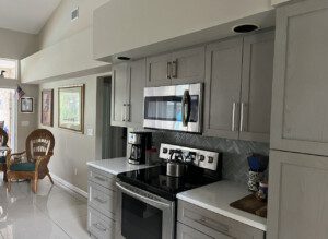 A modern kitchen of a house with a mirror