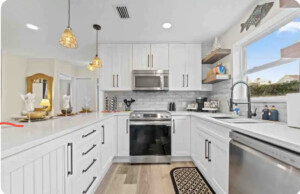 A modern kitchen of a house with a mirror